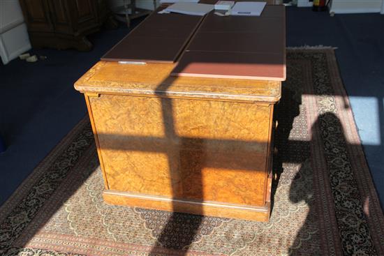 A Victorian burr walnut partners pedestal desk, by Holland & Sons, W.6ft